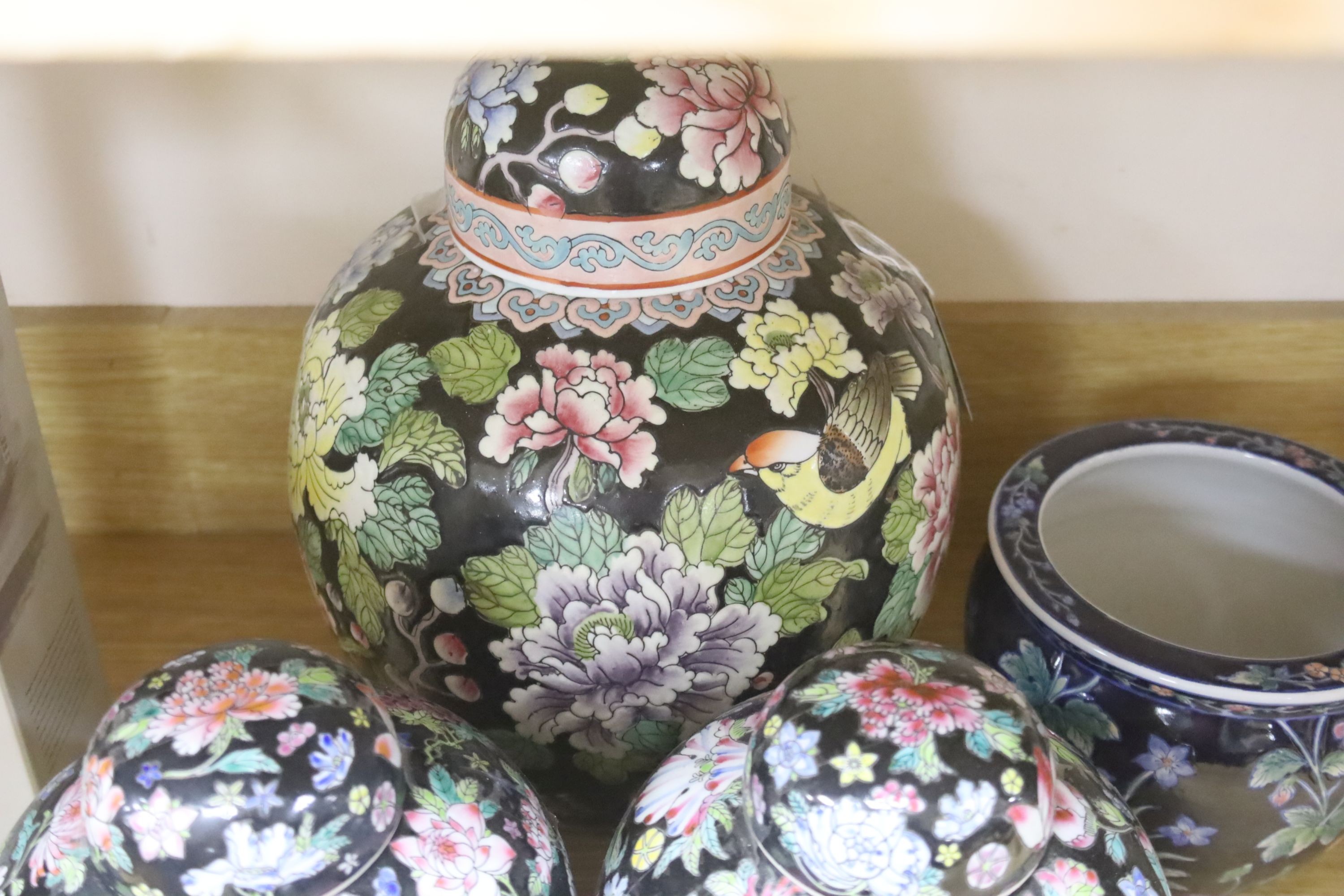 Six Chinese famille rose jars and a jardiniere